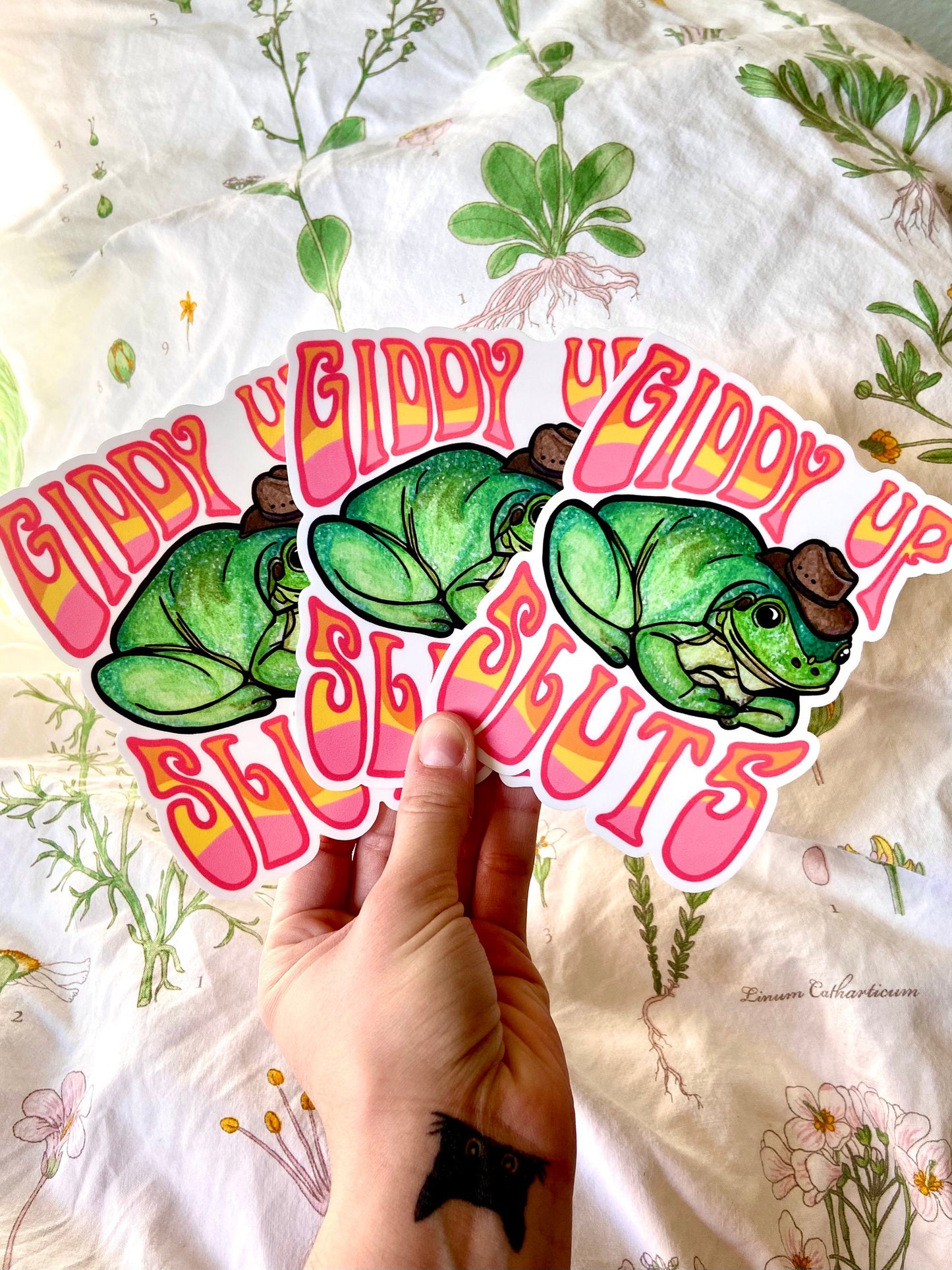 "Giddy Up Sluts" Cowboy Frog Bumper Sticker and Magnet