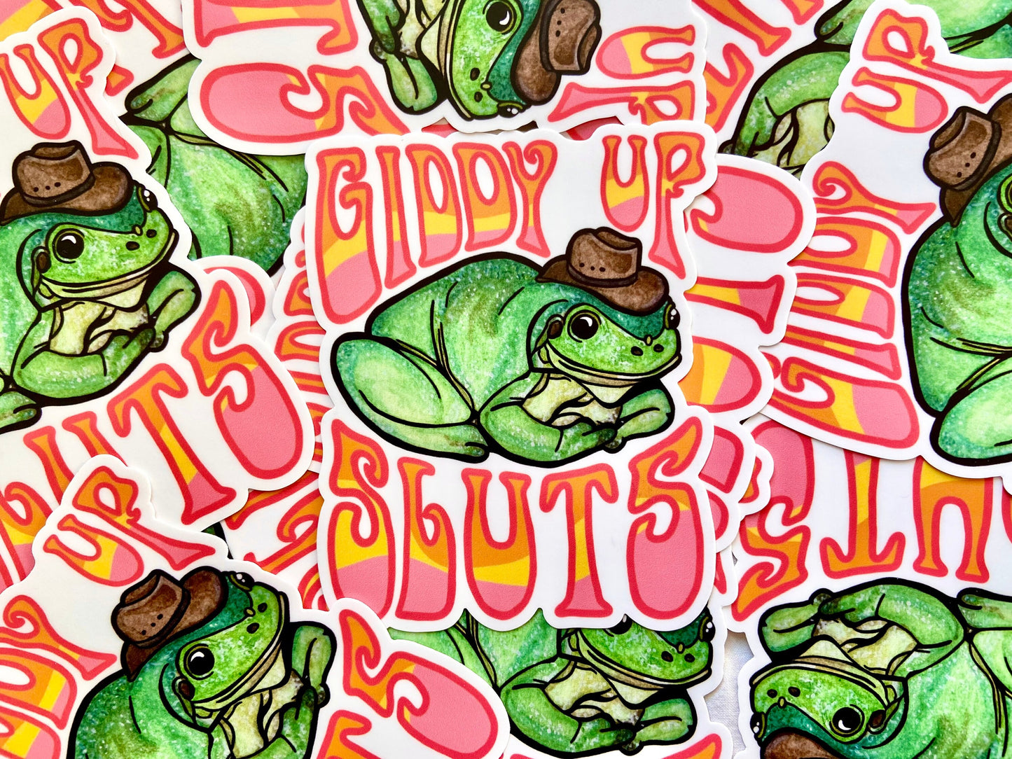 "Giddy Up Sluts" Cowboy Frog Bumper Sticker and Magnet