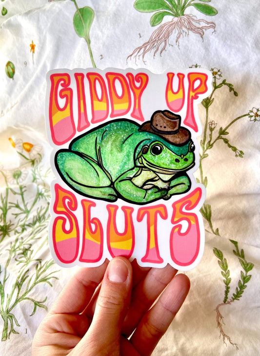 "Giddy Up Sluts" Cowboy Frog Bumper Sticker and Magnet